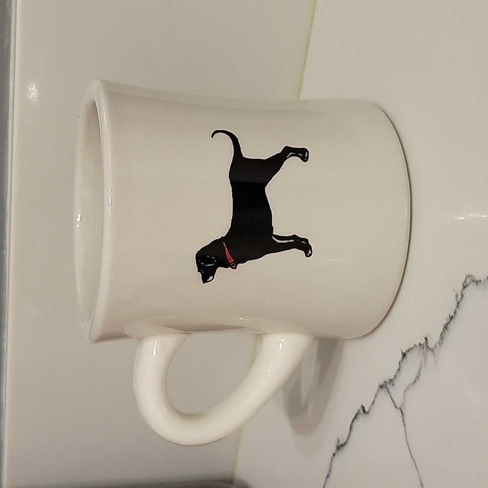 Black dog coffee mug
